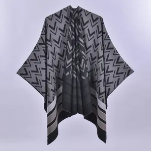 Gray double-sided knit shawl cape with geometric patterns and striped hem for women