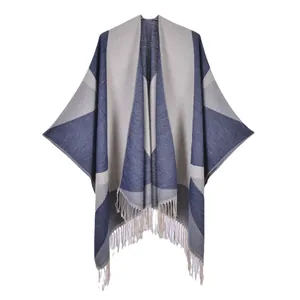 Women's geometric knit shawl with fringes in navy blue and light grey reversible style