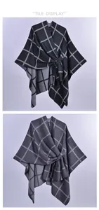 Detail view of plaid winter shawl featuring adjustable side straps and knit texture
