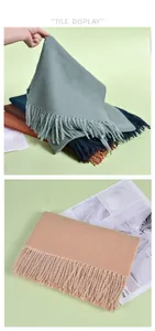 Close-up of fringe edges and soft cashmere-like texture on multi-color scarves