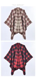 Flat lay detail showing geometric star patterns on two cashmere-feel knit ponchos