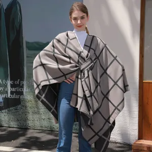 Classic grey and black plaid poncho cape with belted waist and open front design