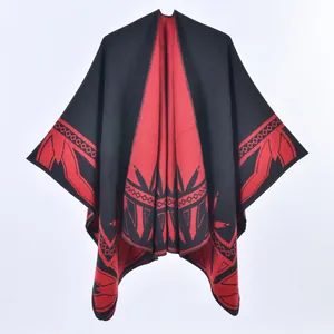 Thick faux cashmere poncho cape with red and black ethnic geometric patterns