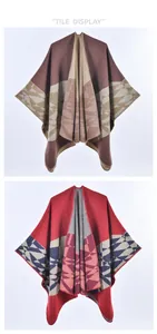 Detail view of geometric knit poncho shawl with thick cashmere feel and split hem