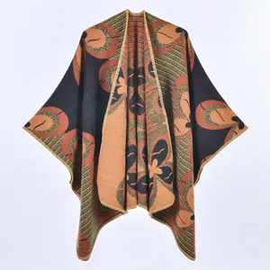 Macro shot of ethnic jacquard knit pattern and lock-stitched edges on warm poncho