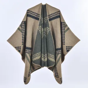 Women's autumn knit poncho shawl with geometric rhombic patterns in earth tones