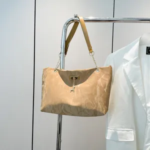 Khaki chain shoulder bag with pleated texture and deer pendant charm for women