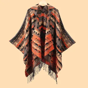 Women's geometric hooded knit poncho with Aztec patterns and fringe tassels for travel