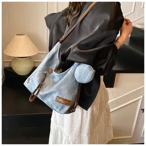 Blue denim texture hobo bag with brown leather straps and detachable round coin purse