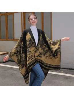 Detail of knit shawl featuring vintage landscape jacquard patterns and oversized fit