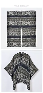Flat and hanging display of geometric knit poncho featuring tribal pattern motifs