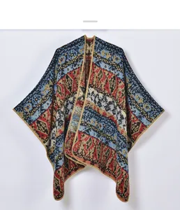 Close-up of bohemian geometric patterns and knit texture on the split cape shawl