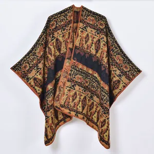 Vintage geometric diamond knit poncho shawl with bohemian pattern in warm earth tones