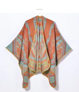 Close-up of bohemian geometric jacquard pattern and premium knit texture of the shawl