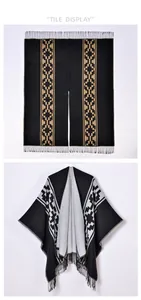 Close-up of geometric jacquard knit pattern and elegant tassels on black bohemian shawl