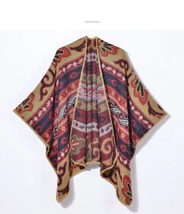 Detail of bohemian paisley pattern and thick knit texture on warm ethnic style shawl