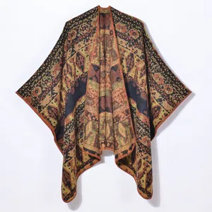 Vintage geometric knit shawl cape with ethnic tribal patterns for winter fashion
