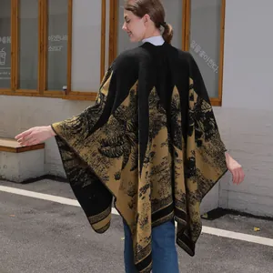 Thick faux cashmere women shawl poncho featuring yellow palm patterns and fringe edges