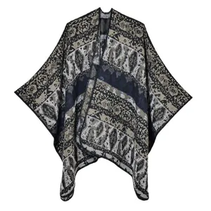 Vintage geometric diamond knit shawl poncho for women with bohemian tassel details