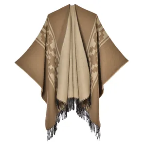 Women's bohemian knit poncho in khaki brown with geometric patterns and fringe detail