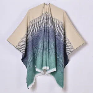 Women's faux cashmere gradient stripe open front poncho with fringe details