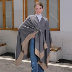 Women's split-front knitted poncho cape with lace-up tie in charcoal and beige