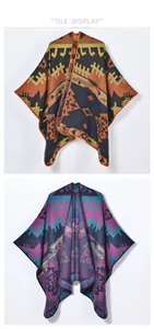 Close-up showing the geometric patterns and hem stitching of two winter capes