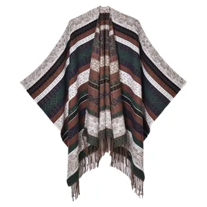 Ethnic bohemian style women shawl with colorful stripes and fringe details on white background