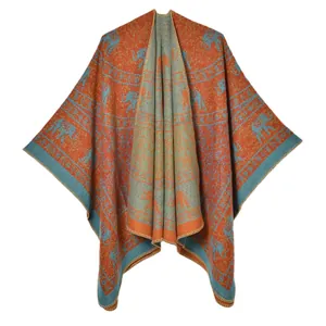 Ethnic thick knit poncho shawl with orange blue elephant jacquard patterns for women