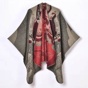 Knitted vintage shawl poncho in burgundy and black with traditional jacquard patterns