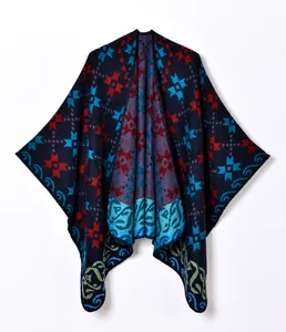 Close-up of ethnic geometric star patterns on soft thick navy knitted shawl
