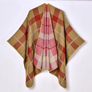 Women's vintage plaid poncho cape in ginger and red oversized warm knit wrap