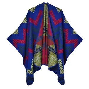 Women's royal blue knit poncho with geometric diamond pattern and ethnic style design
