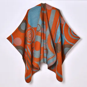 Abstract geometric knit shawl wrap for women with orange and teal color blocking design