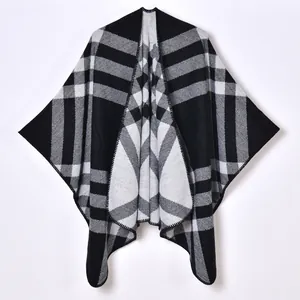 Classic black and white oversized plaid knit shawl poncho for women in a soft drape style