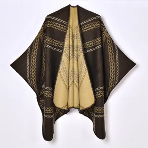 Retro jacquard knit poncho for women in two-tone coffee and beige with golden patterns