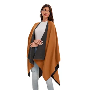 Close-up of double-sided two-tone cashmere shawl with split front design for women