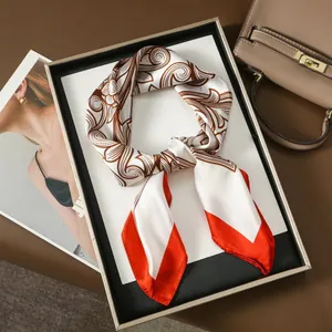 Ethnic retro silk scarf with ivory base, brown scroll patterns and orange borders