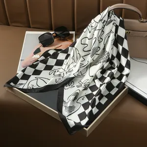 Elegant black and white checkerboard silk scarf with abstract lines and satin finish