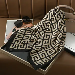 Elegant 70x70 silk square scarf with beige and black geometric interlocking patterns