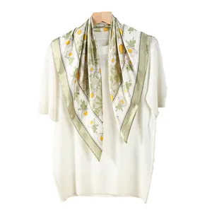 Elegant white square silk scarf with fresh daisy print and green border styling