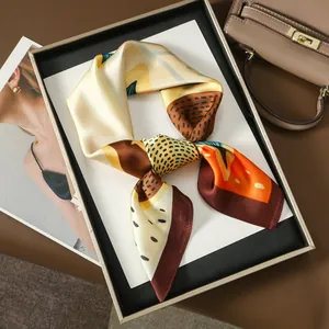 Elegant cartoon print silk scarf for women featuring abstract geometric patterns and warm tones