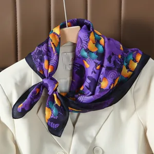 Elegant 70cm silk scarf with retro ginkgo print on white blazer and brown leather