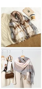 Detail of checkered fringe scarf in coffee and beige cashmere-like warm fabric