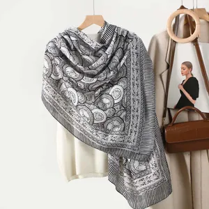 Fashionable retro black and white paisley silk-feel scarf with elegant geometric patterns