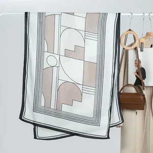 Elegant geometric print long silk scarf with minimalist black and beige abstract patterns