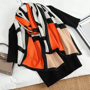 Women's warm velvet scarf with geometric color block patterns and stylish shawl design