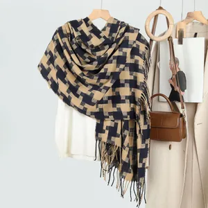Houndstooth tassel scarf for women featuring a black and beige geometric vintage pattern