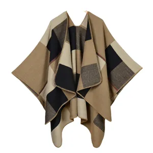 Ethnic plaid poncho cape for women in thick neutral fabric with classic geometric pattern