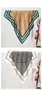 Detailed tile display of a satin silk scarf with geometric maze pattern and sleek texture